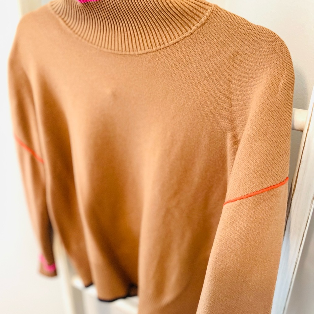 Never fully Dressed roll neck sweater